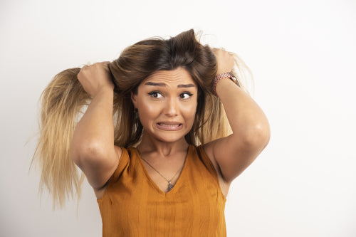 The Link Between Stress and Hair Fall: How to Manage Both